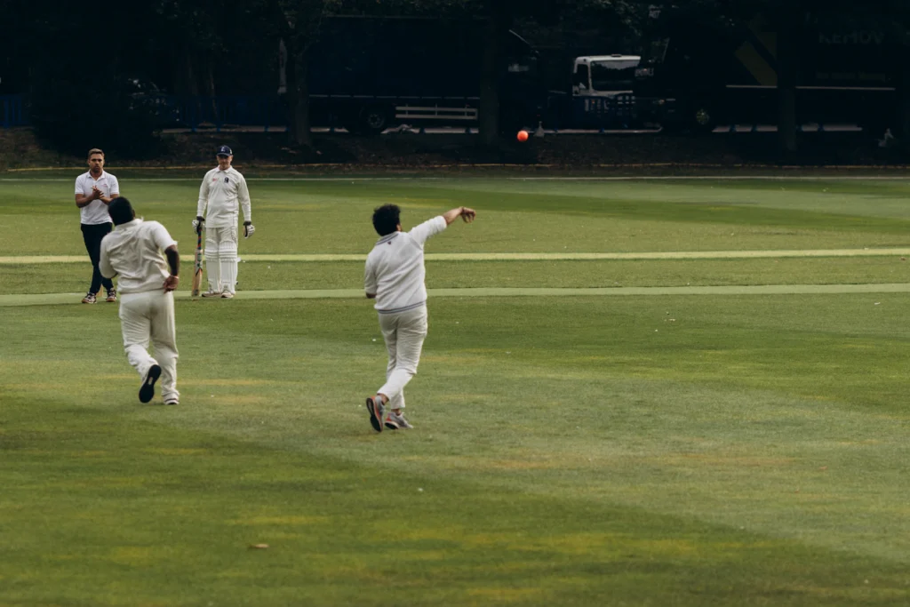 Bowler and fielders appealing during a club cricket match
